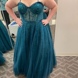 I absolutely love the dress, but it’s taking up too much room in my closet.